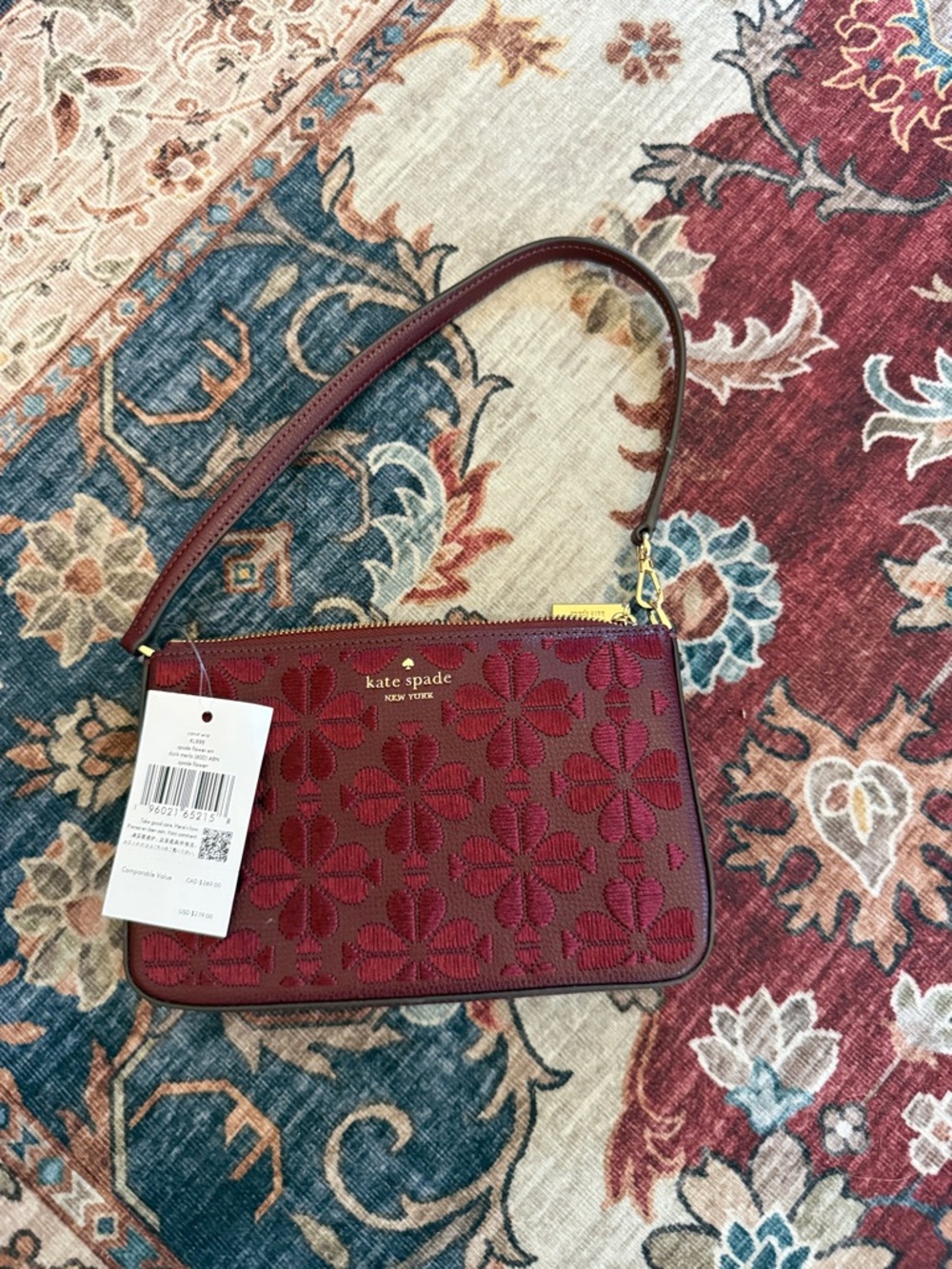 kate spade Red Floral Embossed wristlet Bag with Gold Hardware